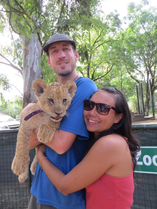 Toby and Rodora with a 3 month old Lion cub